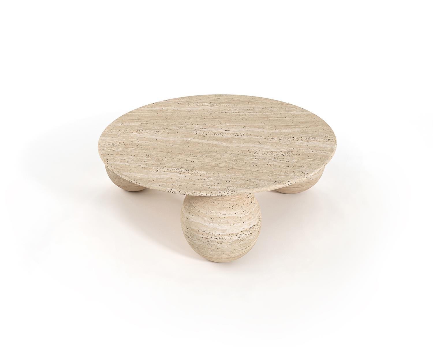 Round travertine coffee table with three spherical legs