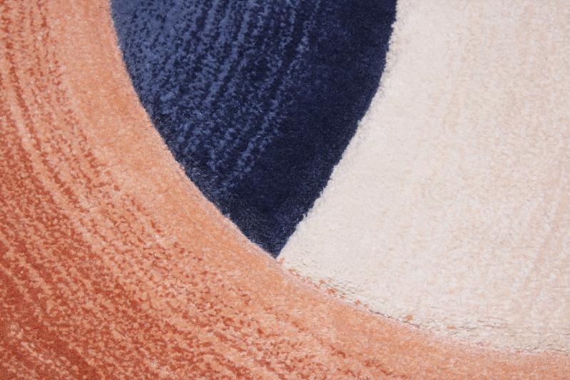 Circle Tufted Rug placed in a sophisticated living area, adding a touch of modern elegance with its unique design.