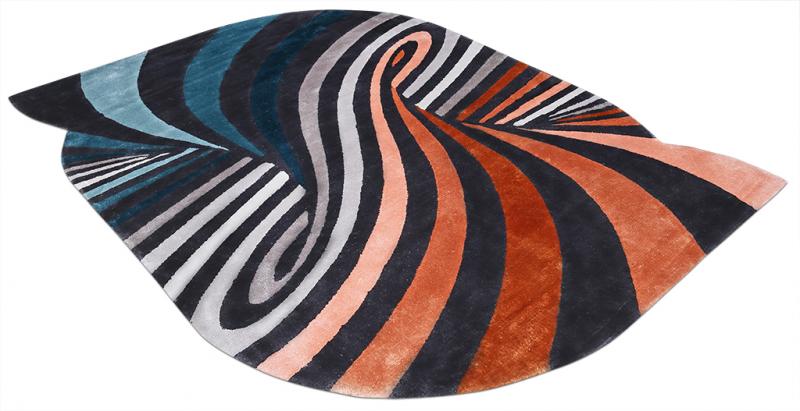 Eye-shaped rug with swirling blue, gray, orange, black stripes
