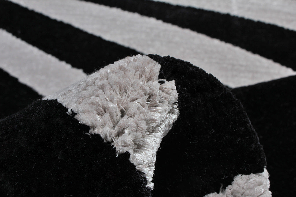 Close up view of black and white striped rug texture