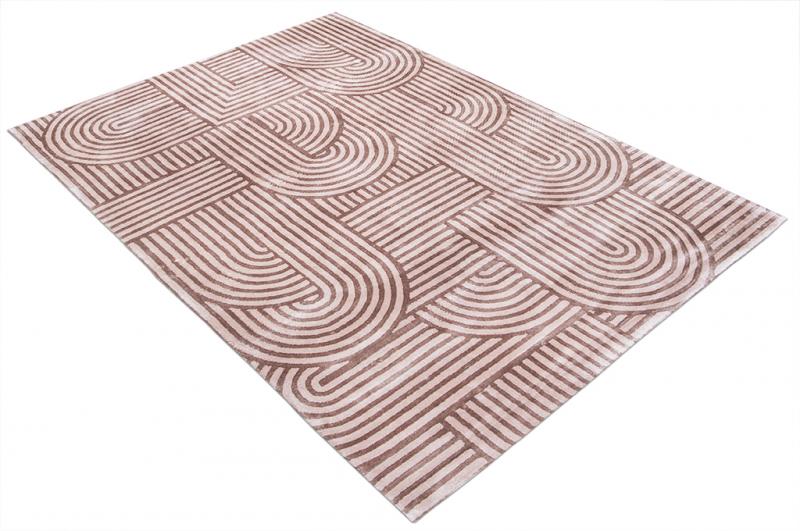 Angled close-up of the Luzione 906 Trace Tufted Rug. Brown geometric pattern adds modern elegance to living rooms, bedrooms, and offices