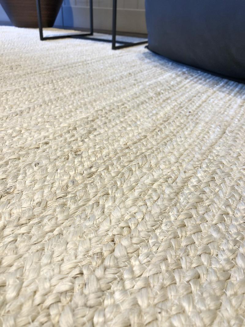 Close-up of Luzione 910 natural fiber area rug showcasing woven texture; durable, stylish, adds warmth to living rooms and bedrooms