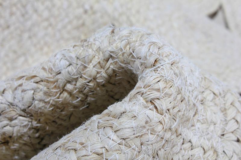 Close up view of woven natural fiber rug texture.
