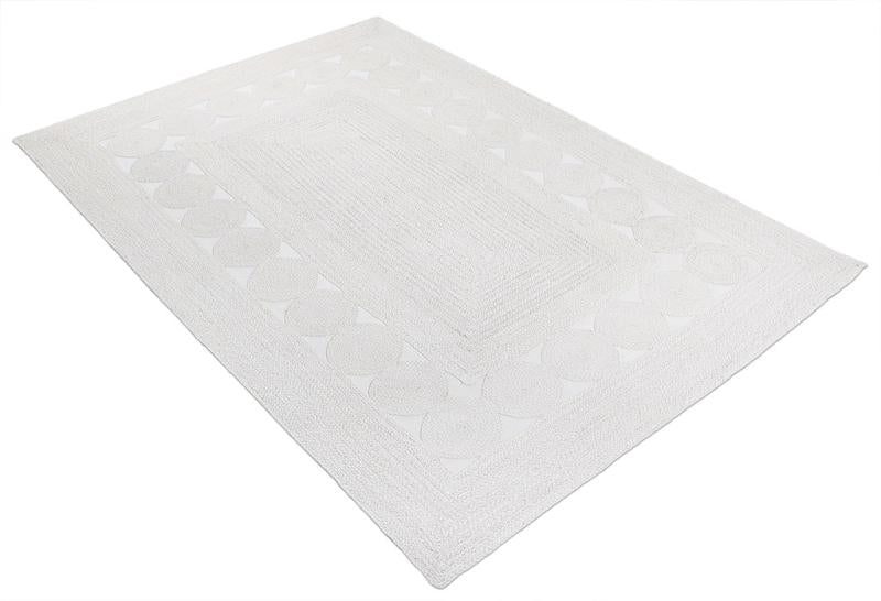 White rug with circular border pattern on white background