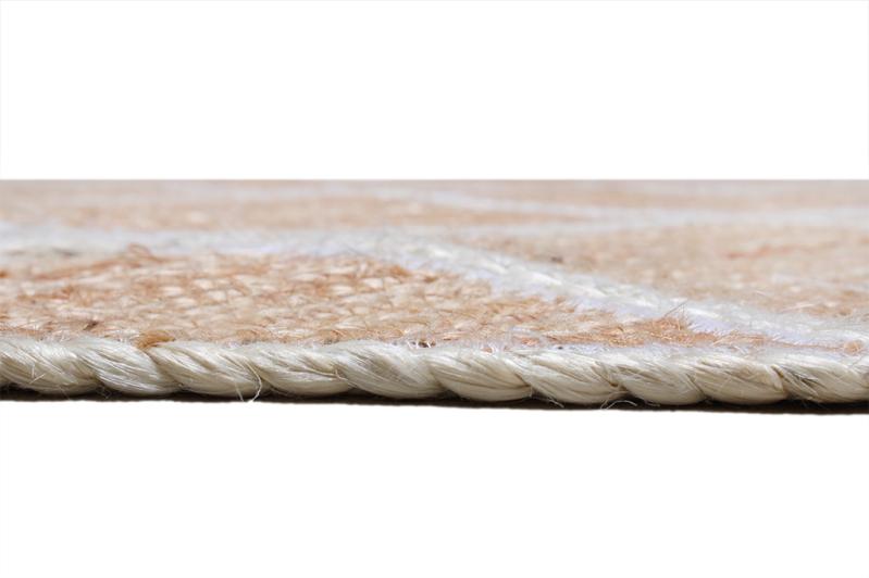 Close up view of natural fiber rug edge binding