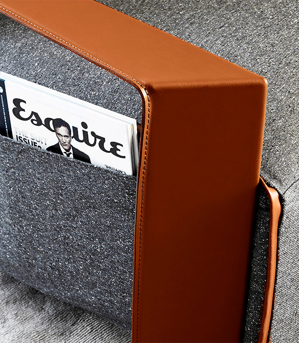 Close up of brown leather and gray fabric magazine holder