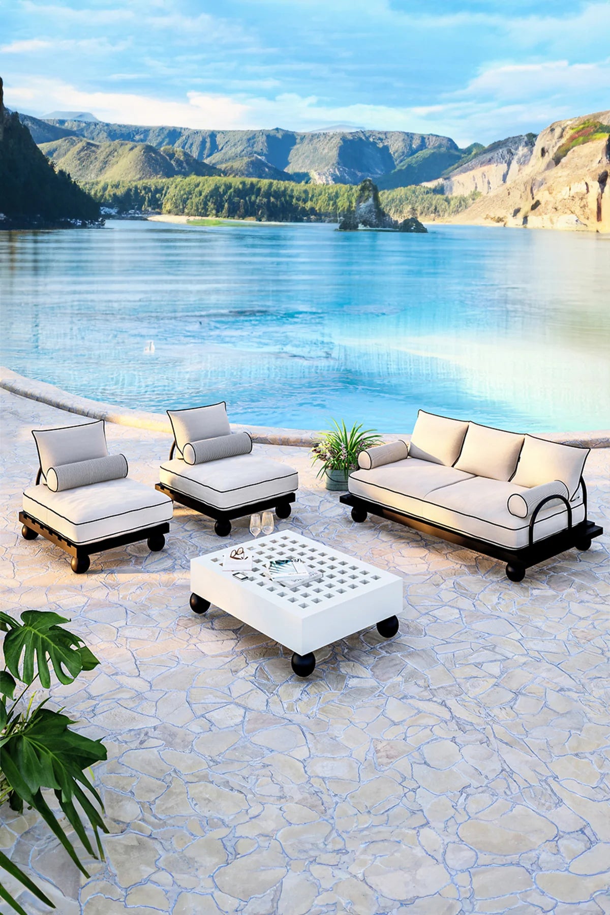 Black-finished iroko outdoor seating set with sofa, armchair, and matching coffee table.