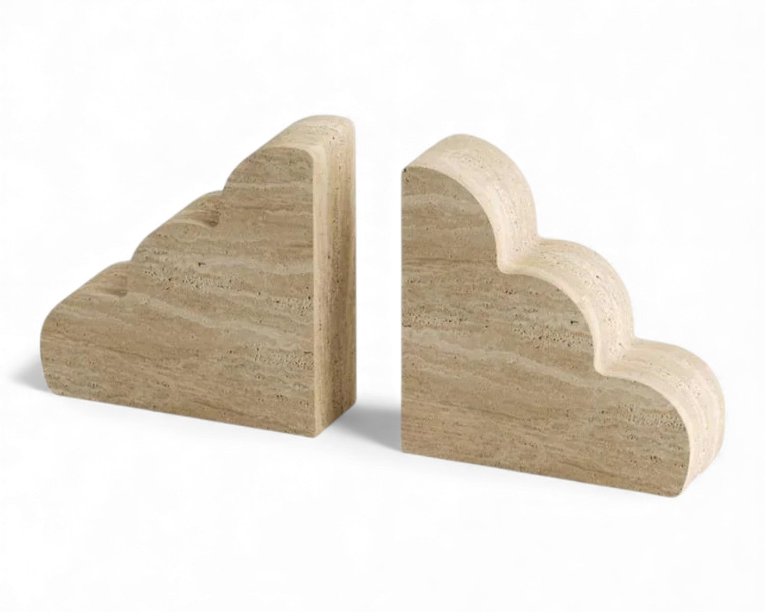 Two travertine cloud-shaped bookends on a white background