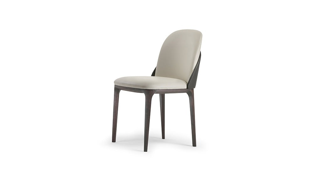 White leather upholstered dining chair with dark wood frame on white background
