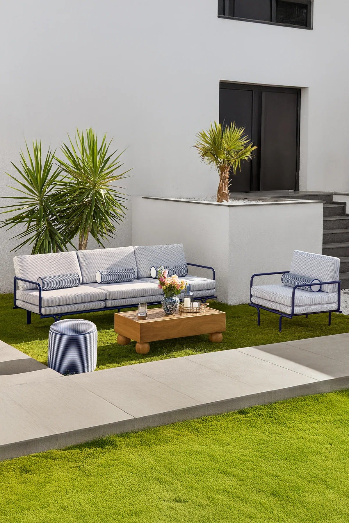 Key West Outdoor patio seating set on a grassy area.